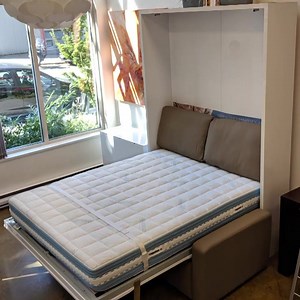 6.3K views · 75 reactions | MurphySofa Minima ! A smart design that seamlessly integrates the wall bed and sofa together. This combination features a glossy white Queen wall bed and a Taupe Eco-Leather Sofa with a matching storage ottoman! | Expand Furniture | Facebook