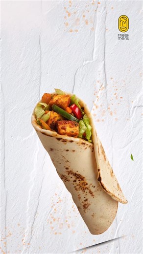 Indulge guilt-free with our hearty, protein-rich roll. We take generous cubes of fresh paneer, pan-toss them with vibrant bell peppers and onions, and coat them in our signature sweet, sour, and fiery Chilli Paneer sauce. This bold filling is then snugly wrapped in a warm, flaky, house-made paratha, creating a satisfying and flavor-loaded meal that truly packs a punch. #freshmenu | FreshMenu