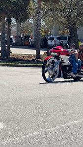 A very cool biker with a big wheel bagger and passenger | ROXOR INFO