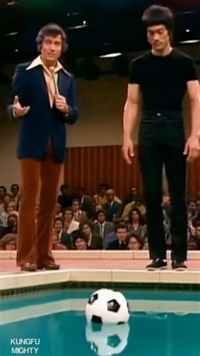 Bruce Lee balances on a floating football… over water. Watch closely. 😳