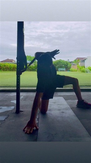 Band-Resisted Half-Kneeling Thoracic Closing Rotation