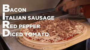 1.2K views · 18 reactions | Pranzarelli's Pizza is now serving "The BIRD". A specialty pizza named for none other than your Myrtle Beach Pelicans. This delicious pizza includes: Bacon, Italian sausage, Red peppers, and Diced tomoatoes! Order yours today! | Myrtle Beach Pelicans | Facebook