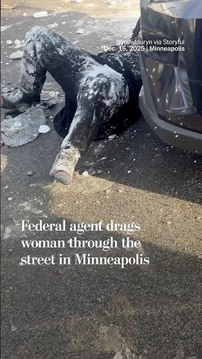 Federal agent drags woman through the street in Minneapolis