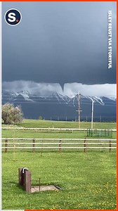 A funnel cloud was seen looming over St Ignatius, in Mission Valley, Montana, according to the National Weather Service. | storyful