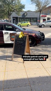 Guess who’s back for more 🐷 VISUAL DESCRIPTION: state patrol car parked in front of the smitten kitten, the camera pans to a cardboard glory hole and a sign that says “I came to Smitten Kitten and couldn’t find their glory hole” | The Smitten Kitten
