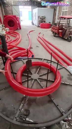 The coiling process of the spiral suction and discharge hose