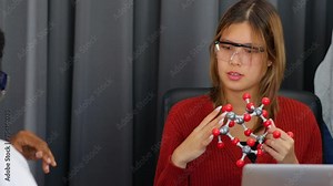 Group diverse students boy and girls looking at models solar system in an astronomy class. Dlectric planet models. chemistry class. Diverse student sci workshop