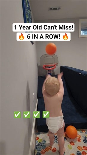 Practice makes prefect for this toddler! Basketball Hooper!