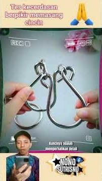 The impossible puzzle of putting a ring onto the center of the iron