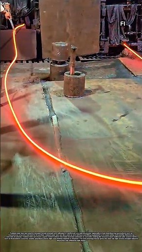 Feeding steel billets into the rolling mill