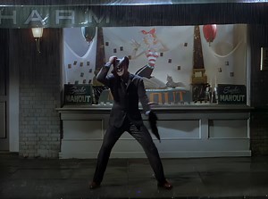 Gene Kelly - Singin' In The Rain (1952) "Singin' In The Rain," performed by Gene Kelly in the 1952 musical film of the same name, is a quintessential example of the joyous spirit of the 1950s' cinema and music. Originally introduced in 1929, the song was composed by Nacio Herb Brown, with lyrics by Arthur Freed, for the Broadway revue "Hollywood Music Box Revue." Kelly's rendition in the 1952 film transformed it into an iconic piece of cinematic history. His performance, characterized by a cheer