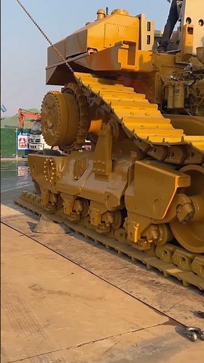 "Caterpillar D11 Gets New Tracks: Watch the Transformation!"