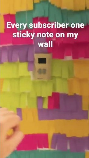 how to put a sticky note on wall