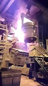 AOD furnace in a Steel Plant metal pouring through laddle into the vessel