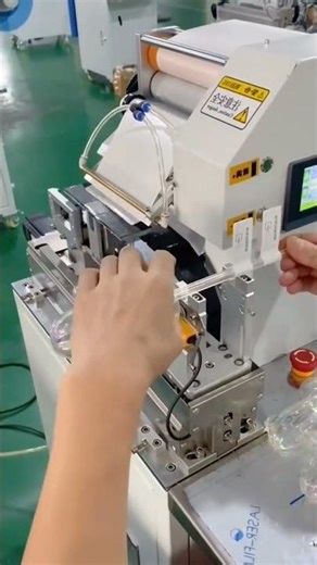 Wire labeling machine is designed for folding adhesive labels in half during application#labeler