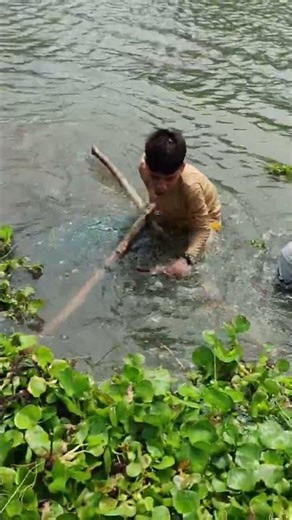 Traditional Fishing in a Village River #shorts #fishing