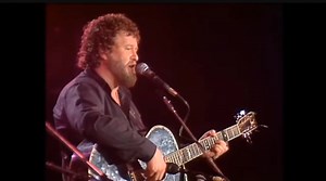 The song "Grace" is about the tragic love story of Grace Gifford and Joseph Mary Plunkett, who married in the Kilmainham Gaol chapel in 1916, hours before Plunkett was executed for his role in the Easter Rising. Written by Frank and Seán O'Meara, the song blends romance and patriotism to tell the story of their love, sacrifice, and Plunkett's devotion to the Irish struggle for independence. #jimmccann #grace | Irish Ballads