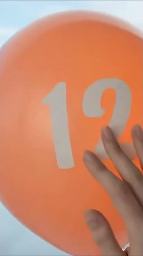 Rubbing Orange Balloon Squeak