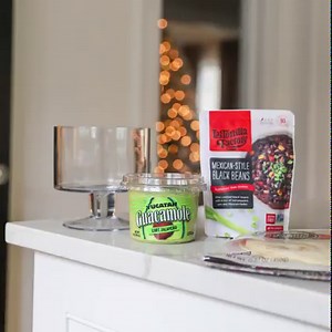 Seasons Eatings ✨🎄😋 Wishing everyone an amazing holiday and a delicious New Year. P.S. Get the recipe for our epic seven-layer dip made with our Authentic Mexican Black Beans and our friends at Yucatan Guacamole and Dips at bit.ly/ltf7dip. | La Tortilla Factory
