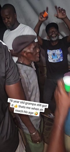 Grandpa Shows Dance Moves While Singing and Playing Guitar