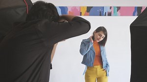 Photographer taking photos of a female model  - Free Stock Video