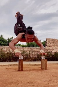 6M views · 10K reactions | Impressive upper body strength and balancing abilities! This fitness master demonstrated his superb physical condition by dipping his fingers in a glass of water in mid air while jumping up from his arms. #FunChina | China Plus Culture | Facebook