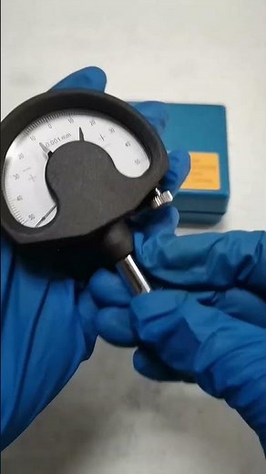 Millimess dial comparator used in manufacture for comparative measurement of distance and angle