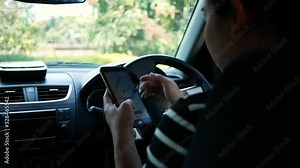 Asian young woman using the Google Maps application on a smartphone to search for directions while driving. Concept of using technology in transportation.
