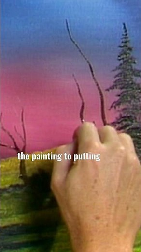 Bob Ross paints highlights into the trees in his painting #paintlikebobross #artist #bobross #art