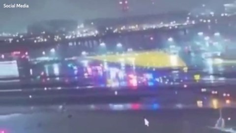 Horror moment plane hits fire truck at LaGuardia airport killing both pilots