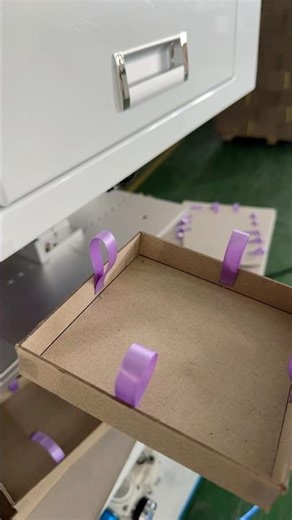 Look at this drawer box automatic ribbon threading machine. #ribbonpastingmachine #drawerbox