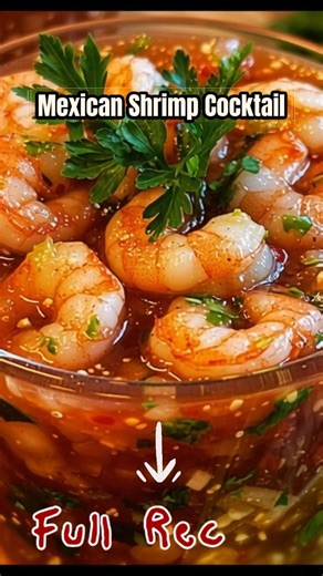 Spice up your appetizer game with this vibrant Mexican Shrimp Cocktail that's refreshing, zesty, and super easy to prepare! Mexican Shrimp Cocktail Recipe Ingredients: 🦐 1 lb cooked shrimp, peeled and deveined 🍅 1 cup tomato juice 🍋 1/2 cup fresh lime juice 🍶 1/2 cup ketchup 🧅 1/2 cup finely chopped white onion 🌿 1/2 cup chopped fresh cilantro 🥒 1 medium cucumber, peeled and diced 🍅 2 medium tomatoes, seeded and diced Directions: In a large bowl, combine the cooked shrimp, tomato juice, 