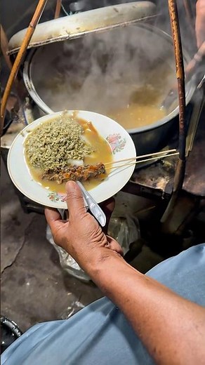 Lontong kupang with clam sauce, a rare, viral and delicious culinary dish in the city of Hresik