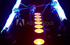 Lighting equipment on the stage of a theater or concert hall. The rays of light from spotlights. Halogen and led light bulbs. Lens lighting. Stage lights, spotlights illuminate the stage at a concert.