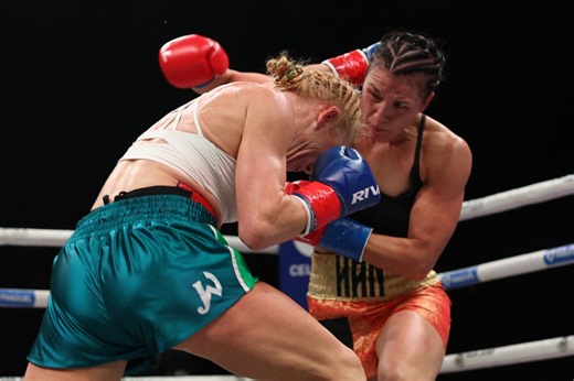 Khan defeated Holm by technical decision