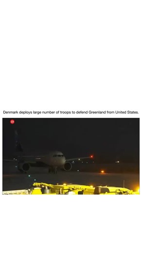 LaughOrbit on Instagram: "Video footage of a nighttime airport tarmac with a parked commercial airplane and yellow ground service vehicles positioned nearby under dark skies and runway lights. Interior sequences show military personnel in camouflage uniforms with red and white shoulder patches entering through glass doors into a terminal, walking individually and in groups, and assembling in the concourse area under fluorescent lighting, with some donning bright yellow reflective vests. 💡Tag so