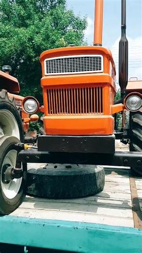 Exploring the Features of an Orange Tractor