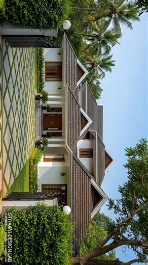 𝐒𝐓𝐇𝐀𝐀𝐘𝐈 𝐃𝐄𝐒𝐈𝐆𝐍 𝐋𝐀𝐁 on Instagram: "A serene, traditional Kerala-style beauty—this 3BHK welcomes you with a grand tiled sloping roof, crisp white façade, and warm wooden accents that instantly elevate its charm. The symmetrical gable elements, classic pillars, and lush green landscape create a peaceful resort-like vibe right at your doorstep. The patterned stone-and-grass driveway adds a premium touch, guiding you gracefully toward the inviting wooden main door. A home designed for