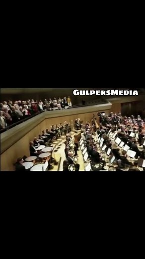 Orchestra Conductor gets a happy surprise birthday mid concert! 🎂 🎶