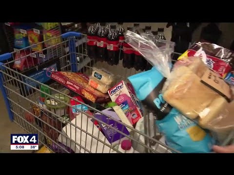 Last-minute shoppers stock up before the storm