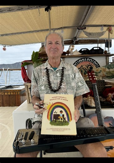 Floating Across the Horizon: The Sound of the Hawaiian Steel Guitar 🌊🎸 To sit on the deck of the traditional voyaging canoe Kamoauli and listen to Uncle Danny share the history of the Hawaiian steel guitar is to take a step back in time. Uncle Danny, a master of the instrument, generously volunteers his time onboard to ensure this beautiful gift is shared wide and far. As he points out toward the horizon, you can almost hear the music as it used to float all up and down the shores of Waikiki i