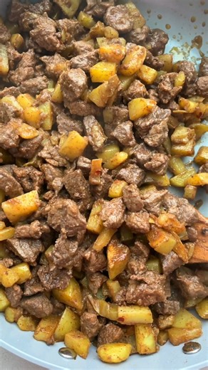 Steak & Potatoes - Lebanese style with ketchup and pita bread! INGREDIENTS 2 tablespoons olive oil 1 pound yellow potatoes, cut cubed 1 ½ pounds sirloin steak, cut into cubes 1 tablespoon 7 spice 2 teaspoons salt Ketchup, for serving Pita bread, for serving INSTRUCTIONS 1. Heat the olive oil in a small pan. Sauté the potatoes for a few minutes then cover and steam for 10 minutes. 2. Add the steak on top of the potatoes. Season with 7 spice and salt and cook for 7-8 minutes until cooked through. 