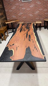 We recently refinished this Red Cedar Epoxy Table. It’s 8 foot by 32” and ready for your home! This table is for sale for $4,500 and can be viewed in our showroom! | Triple L Rustic Designs