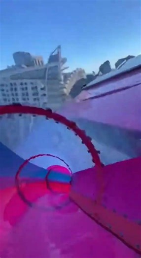 POV: Sky-High Slide Over a City Gap