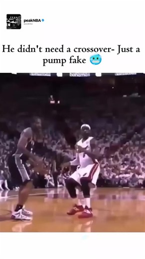 Ray Allen’s legendary shooting reputation made every defensive possession a guessing game, and this moment is a perfect example of why. Wearing his iconic Miami Heat No. 34 jersey, Allen delivers a flawless shot fake that sends his defender soaring past. His eyes never leave the rim, his knees stay loaded, and the ball rises naturally into his shooting pocket before he calmly brings it back down. Every movement is identical to his real jumper, forcing the defender to commit because giving Allen 