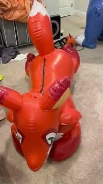 Get dressed and undressed in a double layered inflatable pvc laying fox pooltoy suit