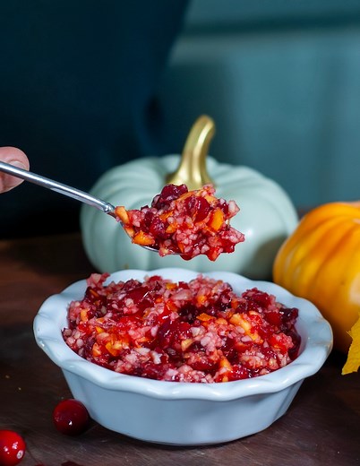 OCEAN SPRAY CRANBERRY RELISH is Bright, tangy and bursting with fresh flavor, this Cranberry Relish with oranges and apples comes together in minutes with only 4 ingredients! If you want this crow and family pleasing recipe type “recipe” in the comment section for this full recipe. It adds a great refreshing pop of color and citrusy zing to your holiday table that's perfect paired with your roasted turkey or ham. #FreshCranberries #FruitRelish #CranberryRelish #FreshCranberryRelish #HomemadeReli