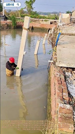 水中工事の極意: 重機でダイナミックに沈める石ドリル設置術