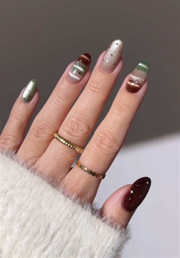 🍃🍪🍵 from cozy winter browns to brighter sage days 🤎 ⊹₊⋆all products are linked on my amzn sf in bio #springnails #naildesign #nailtutorial #nailart #nailinspo green sweater nails gold polka dots