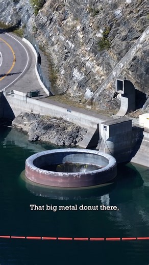 This morning glory spillway has a unique circular drum gate. It can be raised and lowered to allow water to flow down the spillway. #hungryhorsedam #spillway #dam #montana | Armchair Engineer